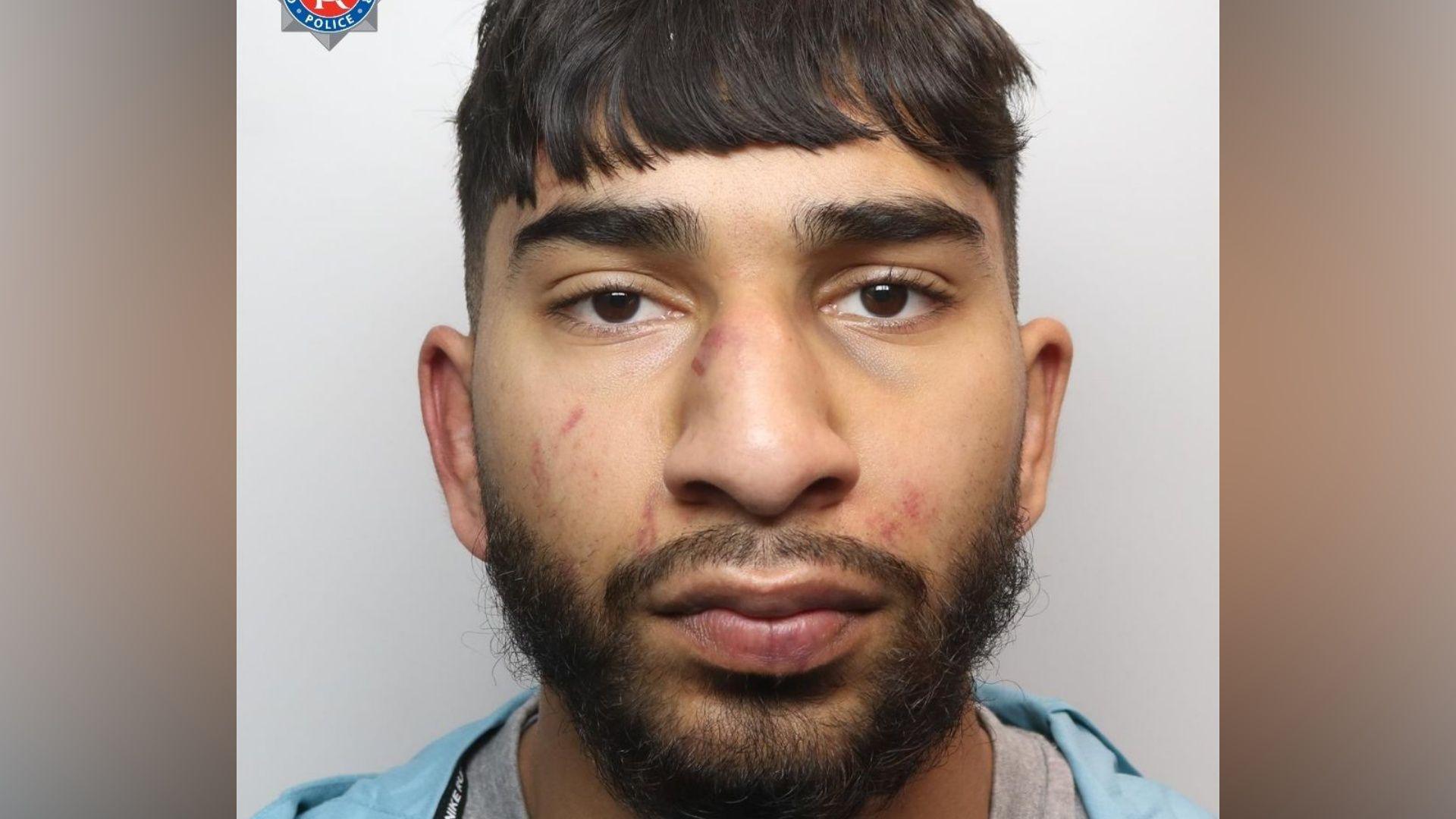 Man who punched female police officers at Manchester Airport jailed