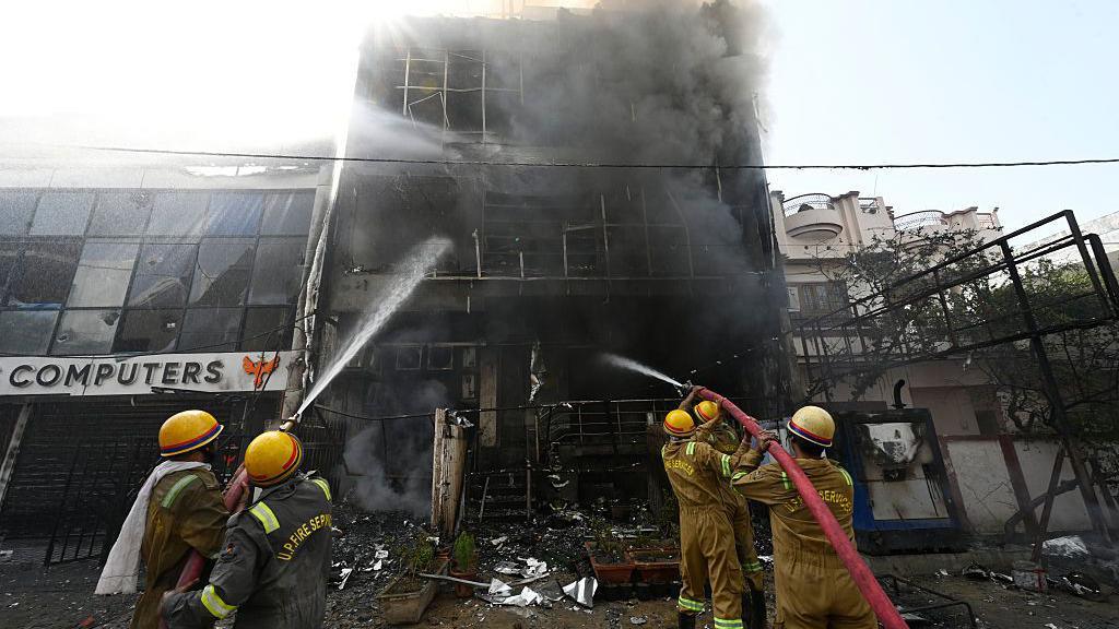 Inquiry ordered after building fire kills 15 in north India city