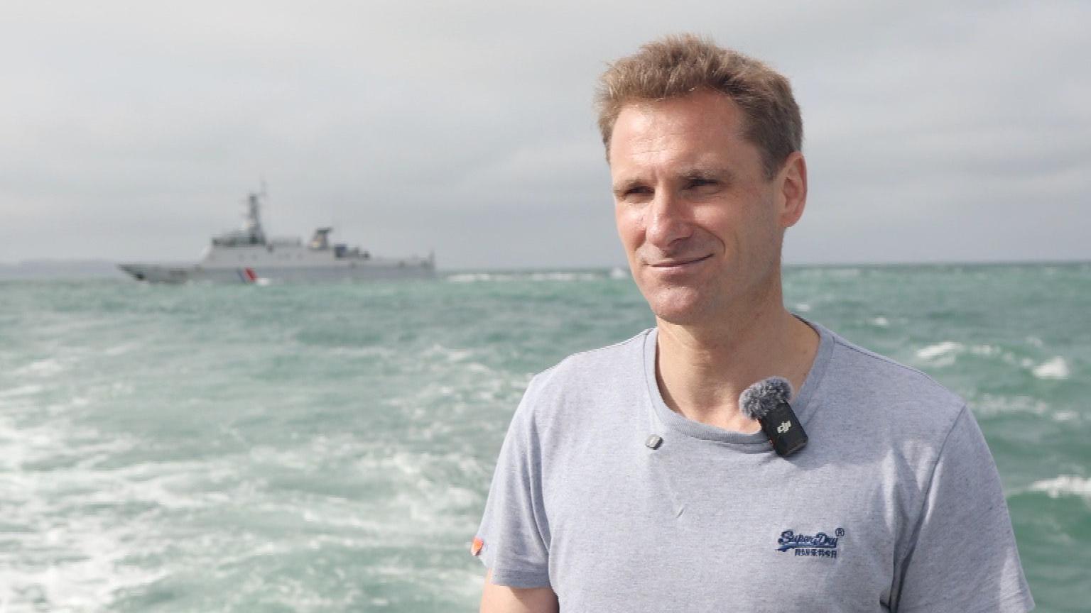 French patrol boat appears to fire shots mid interview