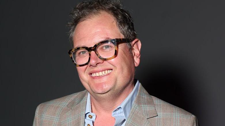 Alan Carr is keeping one unwanted item from his castle auction – see what was sold