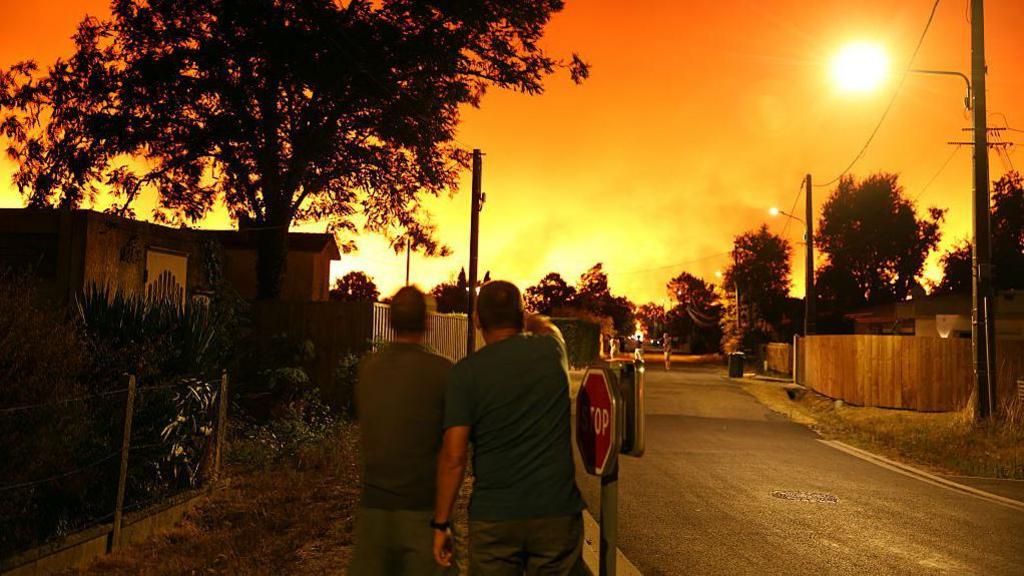 Tourists tell BBC how their holiday turned into race to escape fires